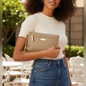Calvin Klein Top Zip Monogram Wristlet Clutch
